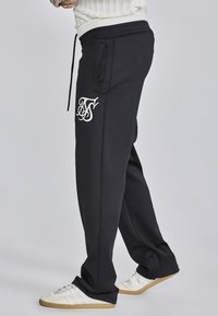 SIKSILK Nadrágok - black