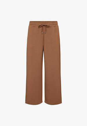 Pruunid, laiad spordipüksid, valmistatud pehmest kangast, koos elastse vöökoha ja paelaga ning küljetaskutega. Sile tekstuur, minimalistlik disain.