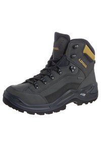 Boot da trekking nero e giallo con supporto alla caviglia alto, chiusura con lacci, suola robusta e materiale impermeabile Gore-Tex.