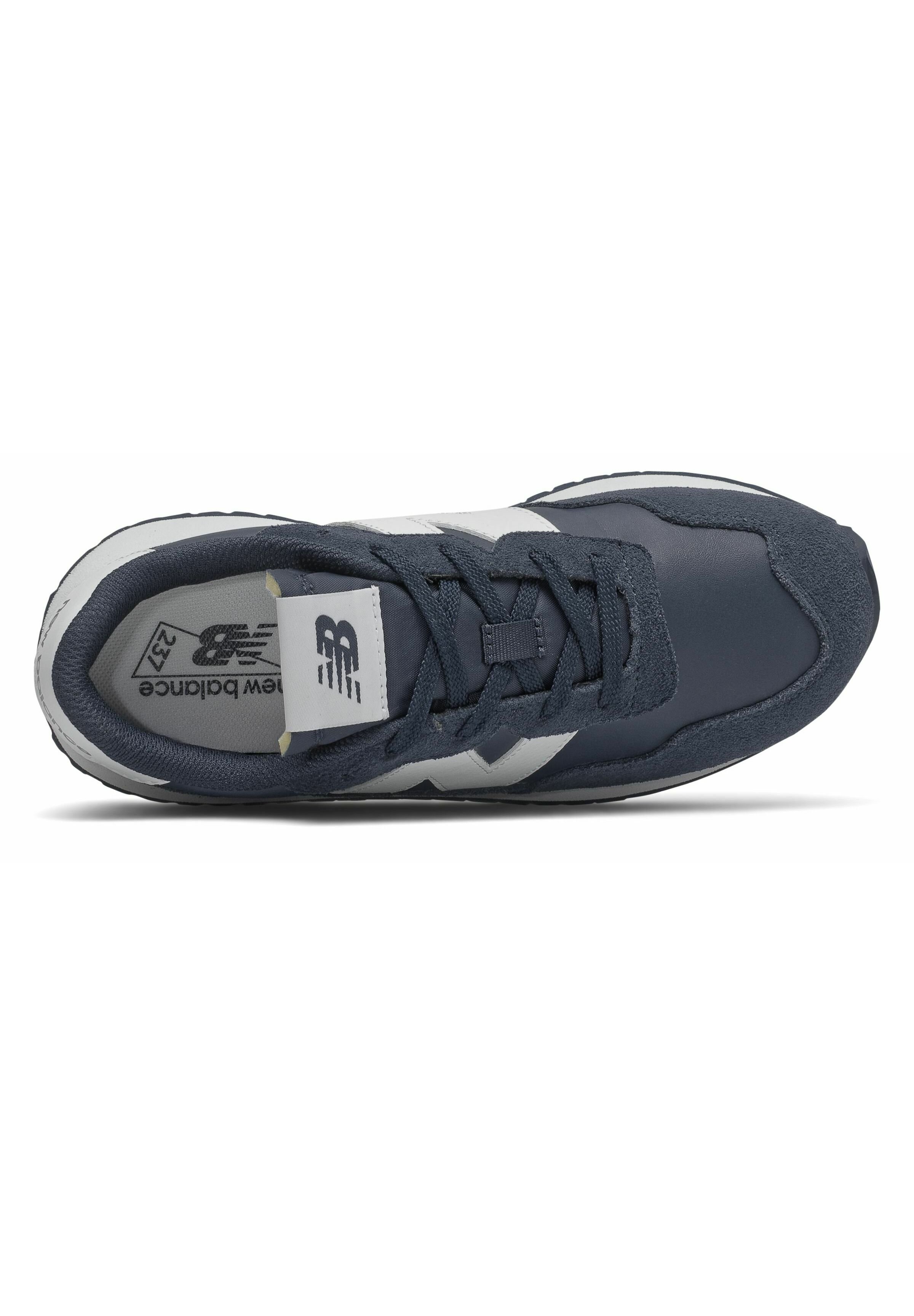 white and navy new balance