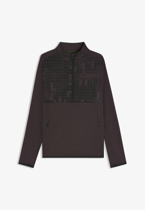 Long-sleeve, zip-up pullover in dark purple, featuring a textured upper panel with a grid pattern, and two side zip pockets.