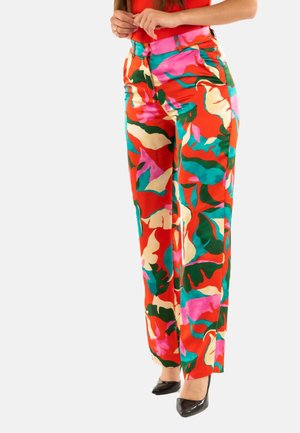 Pantaloni larghi colorati realizzati in un tessuto liscio, con una stampa audace di foglie nei colori rosso, rosa, verde e crema. Vita sagomata con tasche.
