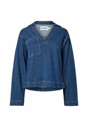 Denimo marškiniai su V formos iškirpte, ilgomis rankovėmis ir krūtinės kišenėle. Audinys yra vidutinio mėlynos spalvos, su šiek tiek tekstūruotu paviršiumi.