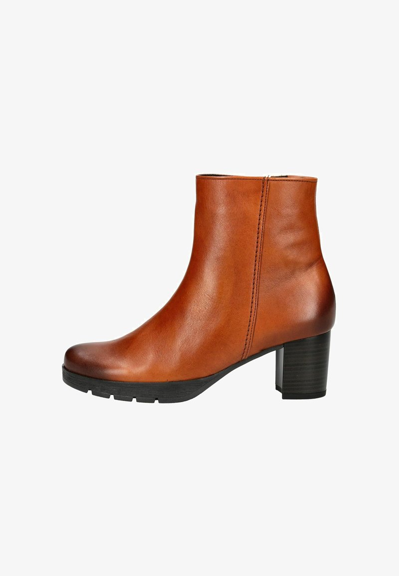 Bottine en cuir marron avec un bout arrondi, fermeture éclair sur le côté et un talon bloc noir moyen. Texture lisse avec des détails de couture minimaux.
