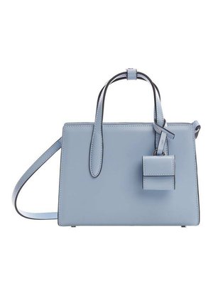 Light blue leather handbag with structured design, double top handles, detachable shoulder strap, and small matching keychain attachment.