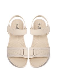Sandali beige con cinturini regolabili, solette testurizzate e suola piatta. Presentano un design a bande incrociate con una finitura liscia. Taglia 37.