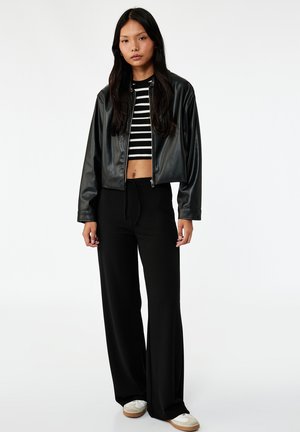 WIDE LEG - Trainingsbroek - black
