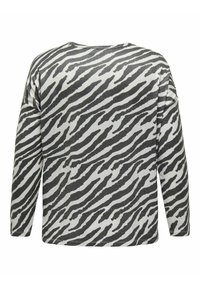 Maglietta a maniche lunghe con motivo a righe zebra in bianco e nero. Realizzata in tessuto morbido con una vestibilità comoda e scollo a girocollo.