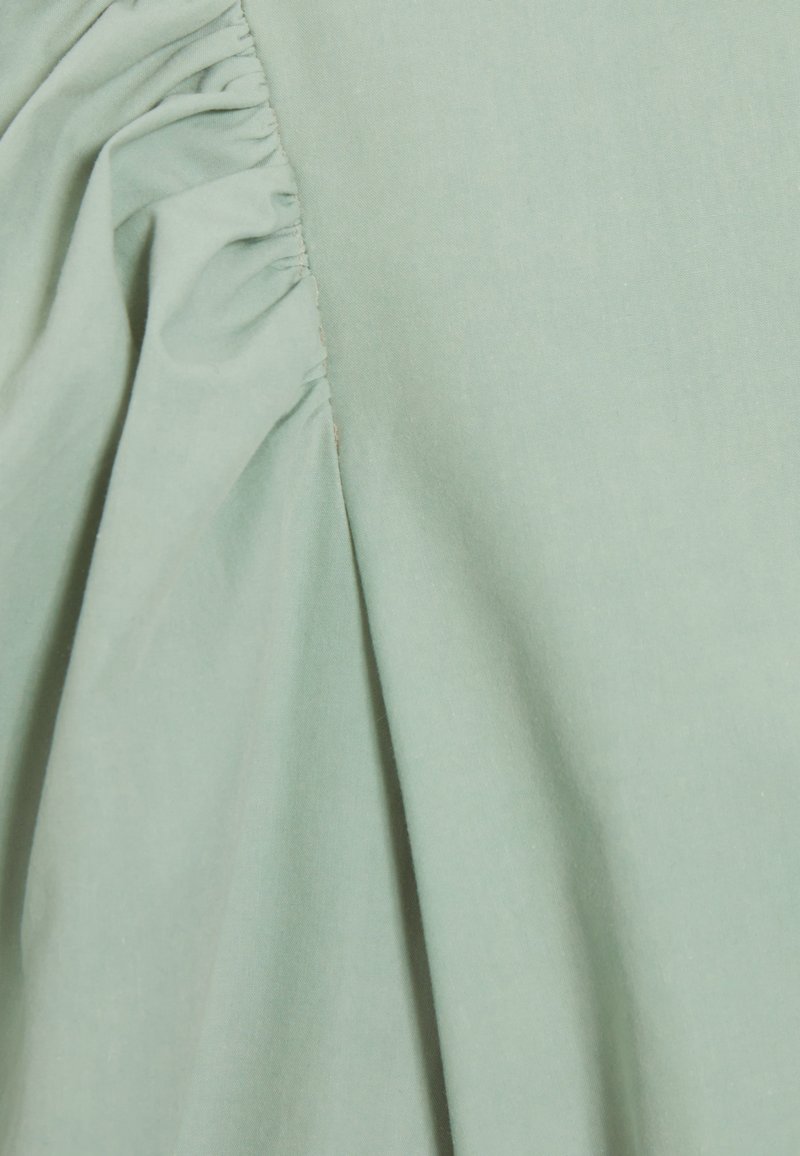 claudie pierlot green dress Robe Claudie Pierlot de seconde main pour Femme main image 1