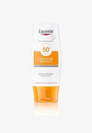 Eucerin sun lotion bottle with white and orange design, featuring SPF 50+, smooth texture, and clear labeling of product features.
