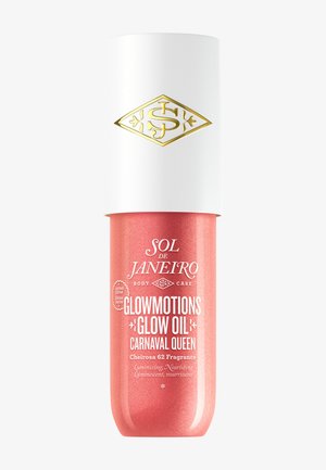 Olejek do ciała Sol de Janeiro Glowmotions Glow Oil Carnaval Queen w lśniącej koralowej butelce z białą nakrętką i złotym logo.