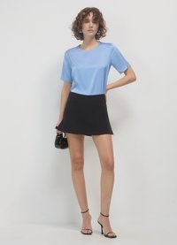 Calliope Camicetta - celeste