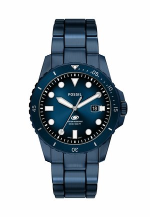 Reloj de pulsera Fossil de acero inoxidable azul con esfera redonda, marcadores de hora blancos, visualización de fecha y bisel giratorio, resistente al agua hasta 100 m.