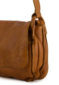 Brown leather messenger bag with a structured design, visible stitching, and a zippered compartment. The surface has a textured finish.