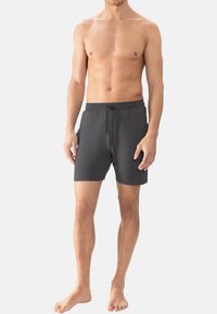 Gray men's swim shorts with an elastic waistband, drawstring, and side pockets. Lightweight fabric, smooth texture, knee-length design.