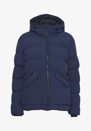 Tengerészkék pufi kabát, cipzáras elülső résszel, húzózsinóros kapucnival, és két ferde cipzáras zsebbel az elején, vastag steppelt textúrával.