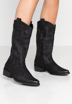 Kowbojki i obuwie motocyklowe