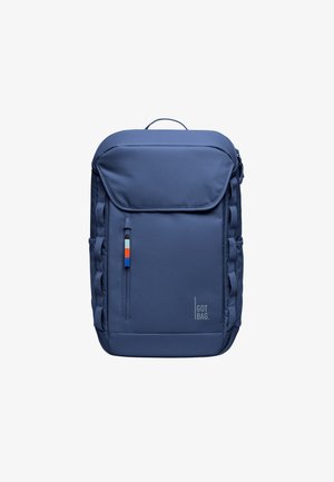 Sac à dos bleu marine fabriqué en tissu durable, doté d'une poche avant avec un tirette de fermeture éclair coloré et de sangles latérales pour le transport. Logo en texte visible.