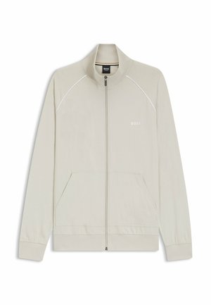 Veste beige clair zippée avec col montant, poches avant, manches longues et logo "BOSS" sur la poitrine gauche.