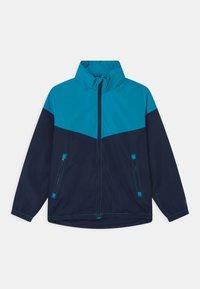 Vindjacka med turkosa övre delen och marinblå nedre delen. Har en hög krage, dragkedjefickor och kontrasterande sömnadsdetaljer.