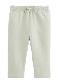 Pantalons de lounge vert clair en tissu côtelé, dotés d'une taille élastique avec cordon de serrage et de poches latérales.