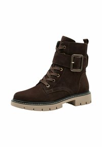 Brown suede ankle boot with a rounded toe, lace-up front, side buckle detail, and a chunky beige sole with a treaded pattern.