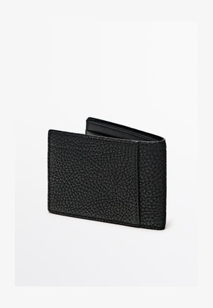 Black leather wallet with a textured surface, slim design, and open top. Features no visible hardware or accents.