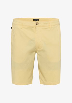 Kollased puuvillased lühikesed püksid, mis on varustatud nööppea ja vööaasadega, omavad siledat tekstuuri. Disain sisaldab külgtaskuid ja sobivat lõiget.