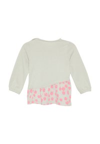 Langsleeve kindertrui, lichtgrijze bovenkant in ribbeltextuur, met een roze bloemenpatroon in de flaired ondersectie.