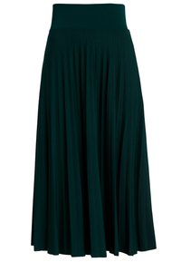 Mörkgrön plisserad kjol med ett brett, elastiskt midjeband. Tillverkad i mjukt tyg som faller vackert och ger en följsam rörelse.