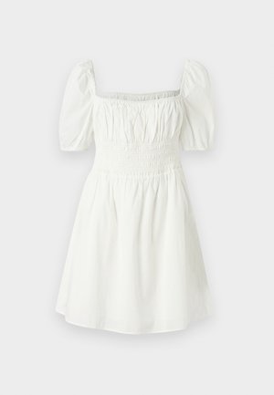 Λευκό βαμβακερό φόρεμα με τετράγωνη λαιμόκοψη, κοντά φουσκωτά μανίκια και σμιλεγμένο μπούστο. Ρευστή φούστα με χαλαρή εφαρμογή και χωρί ς εμφανή σχέδια.