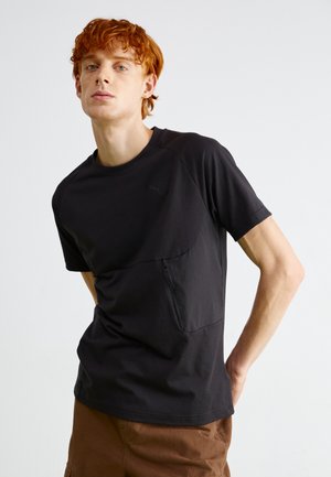 Black athletic t-shirt made of lightweight fabric, featuring a zip pocket on the front and a small logo on the chest. Short sleeves, round neckline.