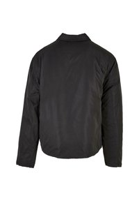 Giacca nera imbottita con colletto, maniche lunghe e texture liscia, dal design semplice e funzionale, senza decorazioni visibili.