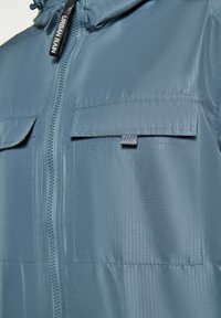 Schmuddelwedda urban rain - Mezisezónní bunda  - graublau