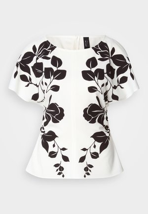 Witte top met zwart bloemenontwerp, korte mouwen en een ronde halslijn. Gestructureerde vorm met een peplumstijl zoom. Rits aan de achterkant.