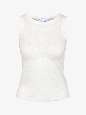 Valkoinen hihaton toppi, jossa on hienovarainen kukallinen pitsikuvio ja pyöreä pääntie.