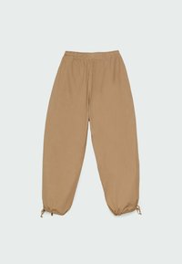 Bruine, lichte, loszittende broeken met een elastische tailleband,Gathered cuffs en trekkoorddetails. Gladde textuur, minimalistisch ontwerp.