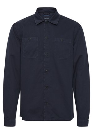Navy blue button-up shirt made of cotton blend, featuring a collar, two front pockets, and long sleeves with button cuffs.