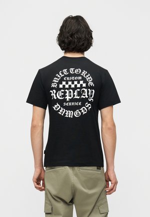 T-shirt con stampa - black