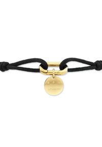 Braccialetto con cordoncino nero regolabile, con fibbia in metallo dorato e ciondolo rotondo con incisione "CPH STUDIOS". Finitura liscia.