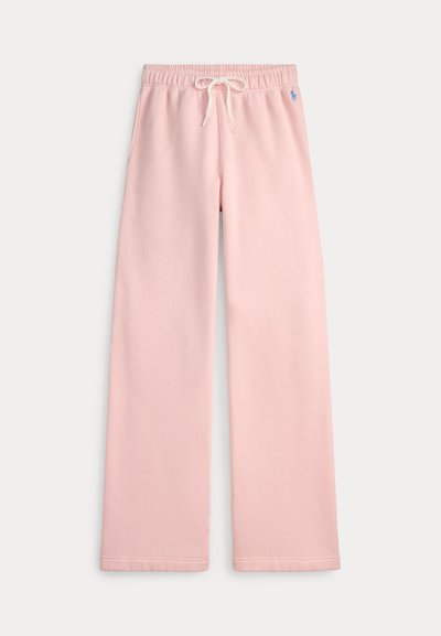 Ροζ ανοιχτό χρώμα φόρμας κατασκευασμένη από μαλακό ύφασμα, με ελαστική μέση και κορδόνι, καθώς και πλαϊνές τσέπες. Διακριτική λογότυπο λεπτομέρεια στο μηρό.