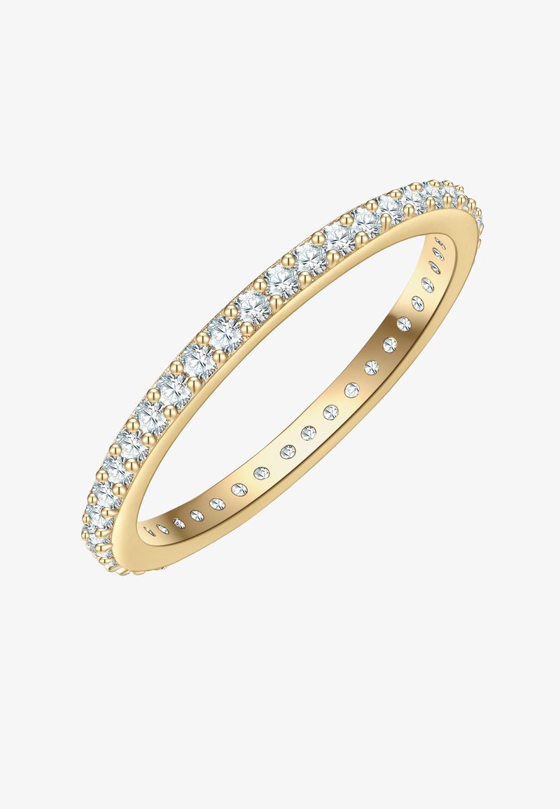 Anillo de oro con una fila de diamantes redondos y brillantes en la parte superior, con un interior liso y pulido y pequeños diamantes en los lados de la banda.