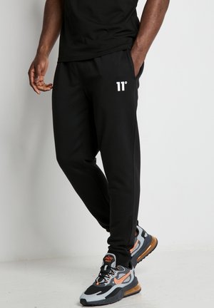 JOGGERS - Pantalones deportivos - black