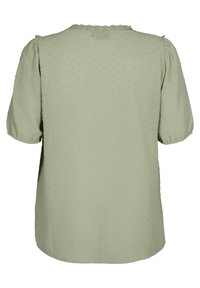 Blusa verde chiaro in tessuto testurizzato con sottili motivi a pois, maniche a puff corte e scollatura a zigzag. Mostrata la vista posteriore.