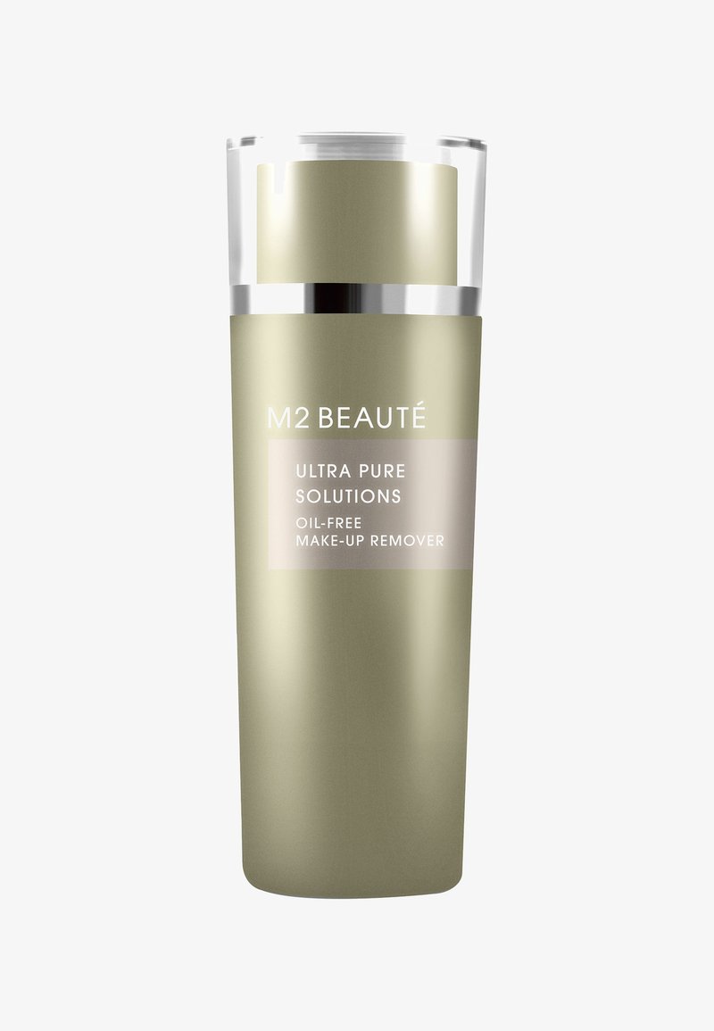 Ölfreier Make-up-Entferner in einer schlanken, frosted grünen Flasche mit einer metallisch silbernen Pumpe und einem Etikett, das Produktinformationen zeigt.