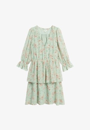 Lichtgroene bloemenjurk met lange pofmouwen, een V-hals met knopen, ruches aan de manchetten en een gelaagde rok.