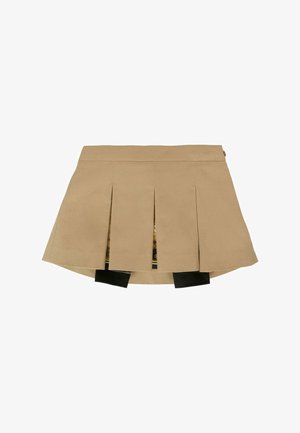 Gonna plissettata beige realizzata in un tessuto liscio. Presenta tre pieghe frontali e dettagli neri sull'orlo, con una fodera interna a fantasia.