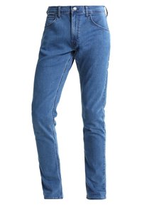 Slim fit blå denimjeans med klassisk femfickdesign, tillverkade av mjuk bomull, med dragkedja och en liten metallknapp för stängning.