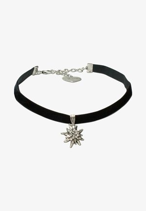 Schwarzes Samt-Choker mit einem silbernen, sternförmigen Anhänger, der einen zentralen Strassstein enthält. Verstellbarer Kettenverschluss mit einem herzförmigen Anhänger.