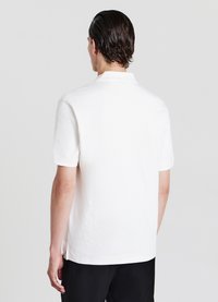 Calliope Polo - bianco lana